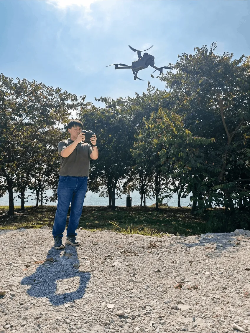 APS Drone Pilot in Singapore flying a drone